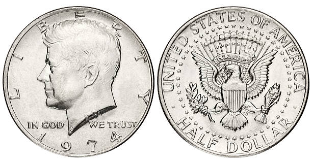 Kennedy half dollar on white background Kennedy Fifty US Cent coin. Isolated on white with clipping path 1974 photos stock pictures, royalty-free photos & images