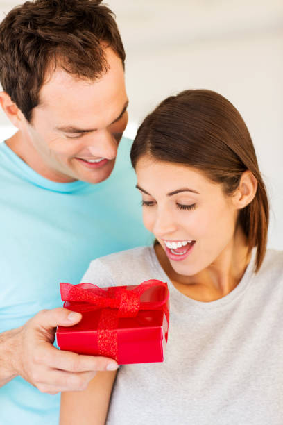 istock Woman Receiving Gift From Boyfriend 172485182