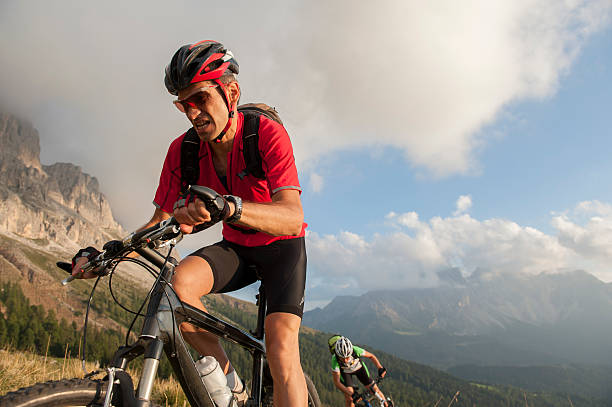 istock Cyclists drive fall in the Dolomites and fight 172485295