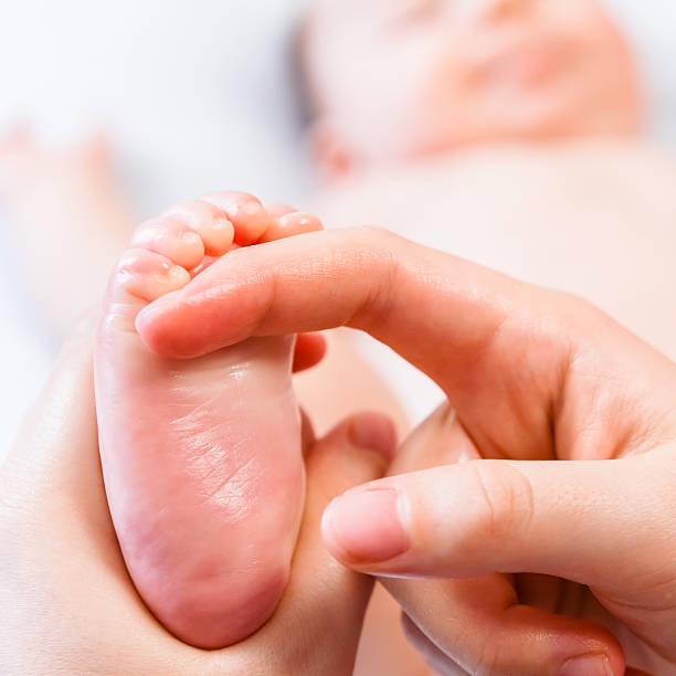 istock Special Foot Massage for a Two Months Old Baby 172485997