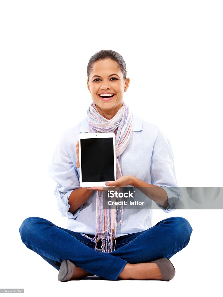 Godendo il suo nuovo tablet al massimo! - Foto stock royalty-free di Abbigliamento casual