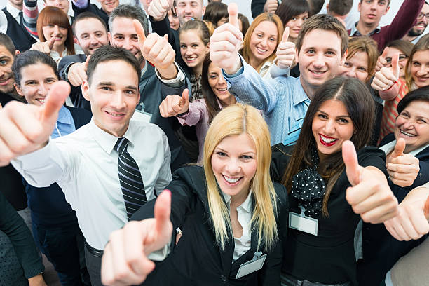 istock Business people holding their thumbs up. 172486229