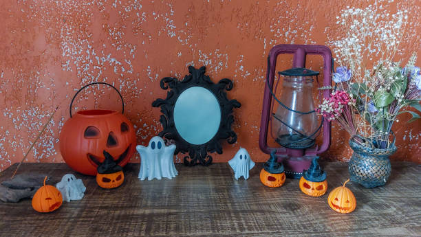 istock Halloween decoration with pumpkins, ghosts and candles 1724865927