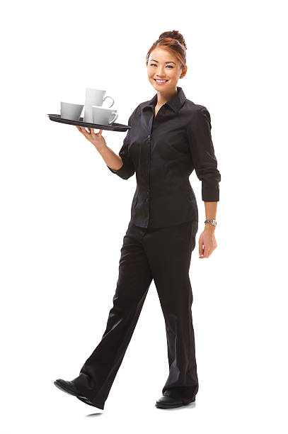young waitress walking with a tray of cups