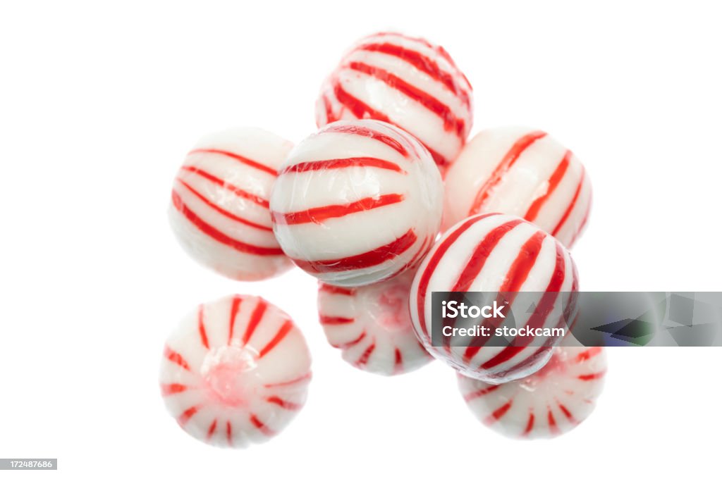 Peppermint Candies Traditional red and white peppermints; isolated on white. Circle Stock Photo