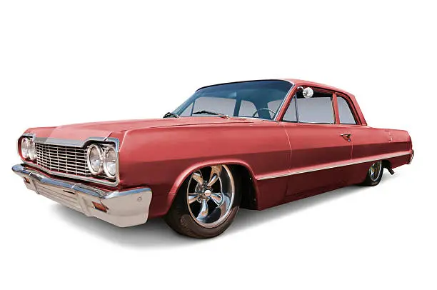 A classic 1964 Impala with old, faded paint. Clipping path on vehicle. All logos removed.