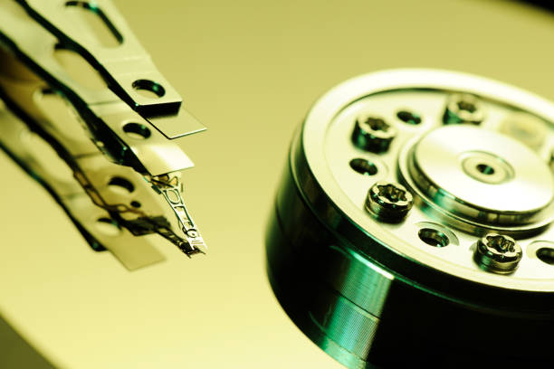 istock Yellow tinted image of opened hard drive 172487970