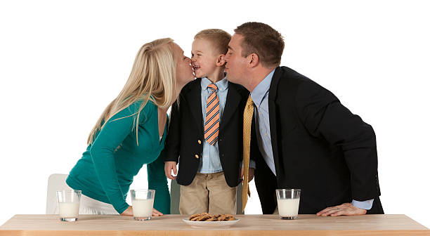istock Parents kissing their son 172488335