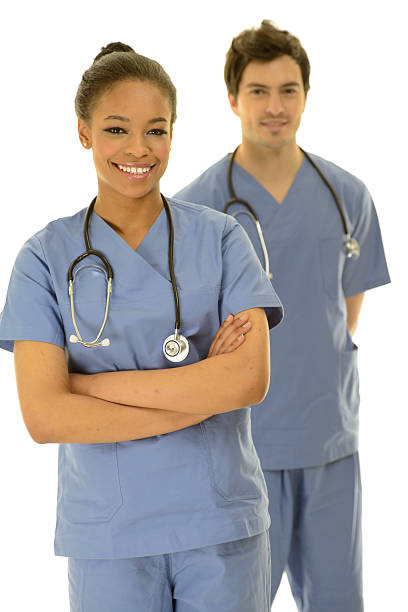 istock Two doctors, one female, one male on a white background 172488462