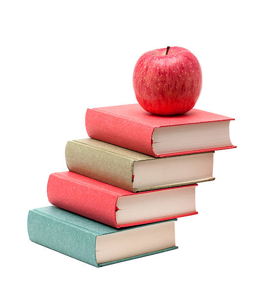 libros y manzana - book stack dieting textbook fotografías e imágenes de stock