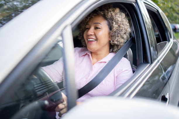 istock Woman is driving a car on her way to work 1724920679