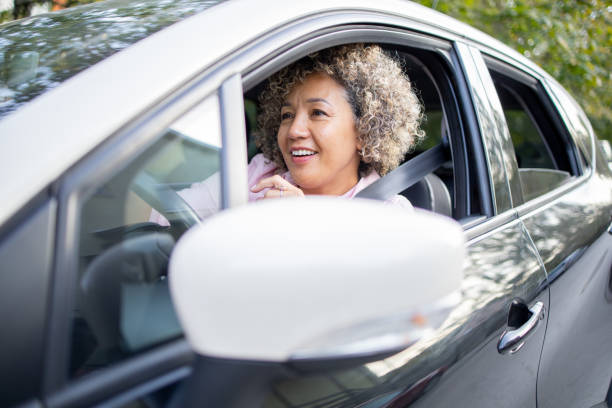 istock Woman is driving a car on her way to work 1724920680