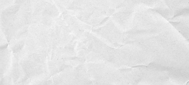 istock Abstract white crumpled and creased recycle paper texture background 1724977502