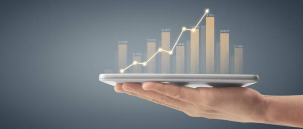 istock Plan graph growth and increase of chart positive indicators ,tablet in hand 1725001262