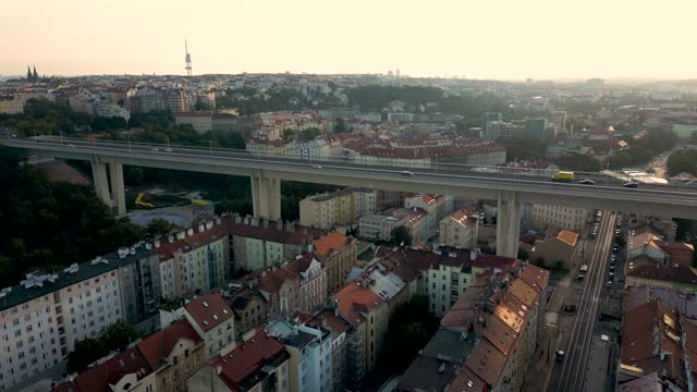 Aerial view of a bridge with car traffic over a railroad in Prague, Europe, 4k