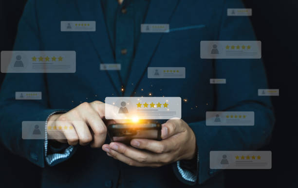 istock Business people using smartphone and pressing review popup on visual screen, customer review by five star feedback, positive customer feedback testimonial. 1725040898