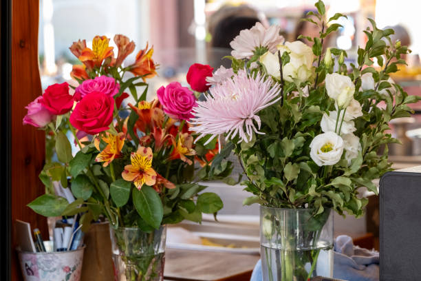 istock summer flowers in a glass with water 1725083826