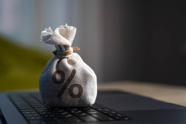 istock Bag with percent symbol on laptop keyboard. 1725087331