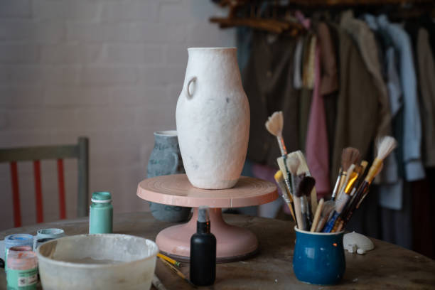 istock Ceramist workplace. Pottery studio workshop. Handmade clay vase. Potter place of work. 1725089030