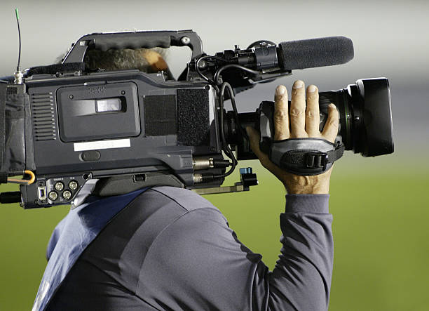 istock television news crew covers the story 172512928