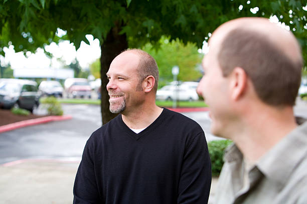 istock guys outside near parking lot 172513095