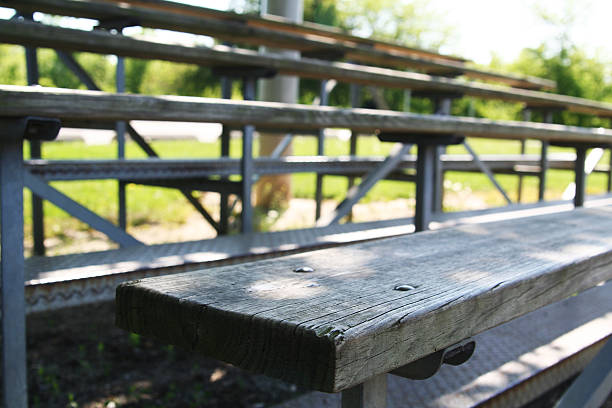 Wooden Bleachers Old, empty bleachers at a baseball diamond wooden bleachers stock pictures, royalty-free photos & images