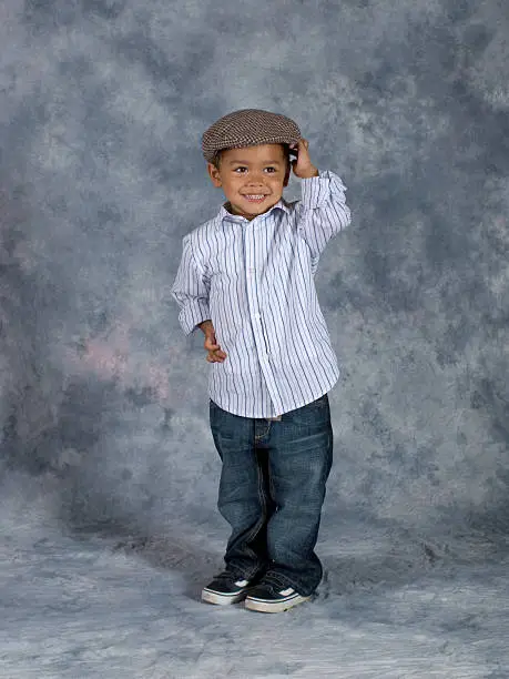 Shown here is a cute mixed race Asian boy posing for his school picture.See other related images here: