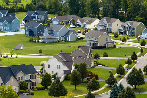 Spacious new single family homes in upstate New York residential area. Real estate development in american suburbs.