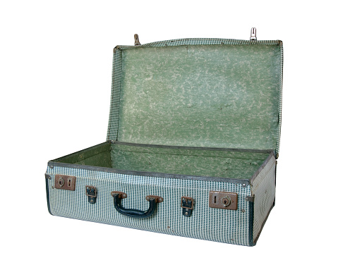 A grungy old retro suitcase on white background