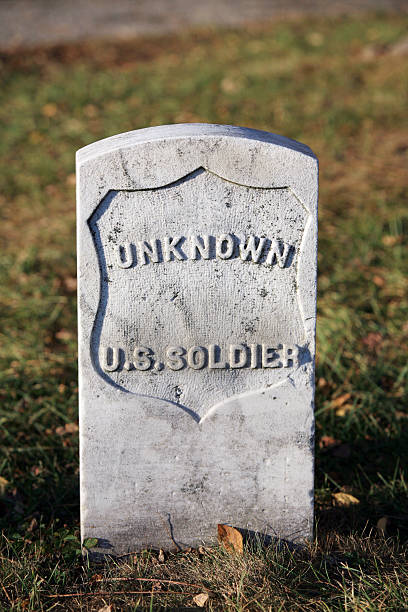 A blank Civil War era tombstone stands in an old Tennessee graveyard.  Plenty of copy space.
