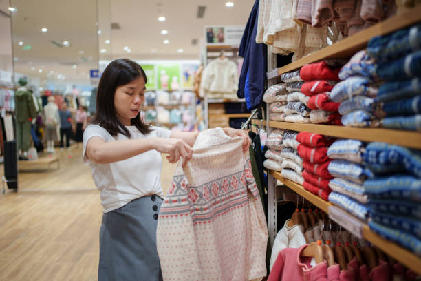 istock women buying clothes 1725149544