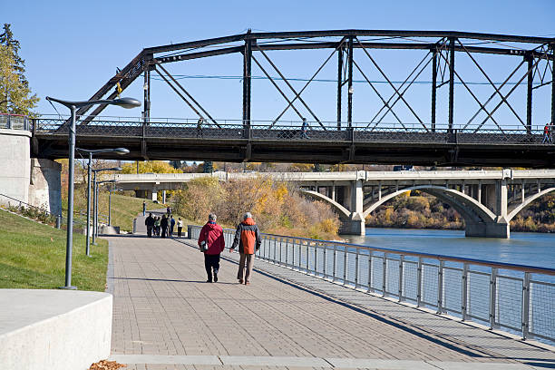 istock Mature Couple Walking on Downtown Saskatoon River Walk 172514995