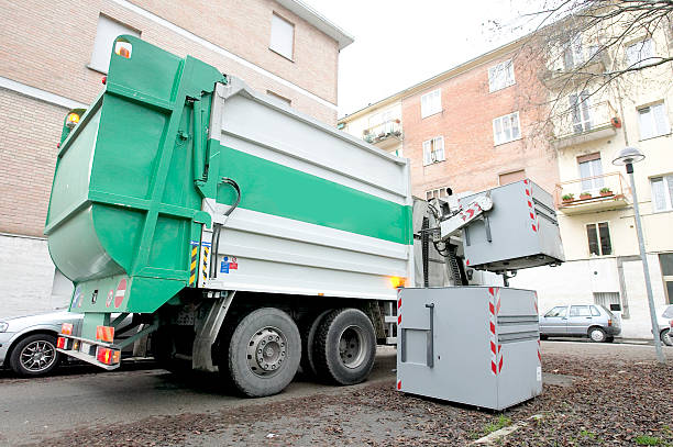 istock recycling bin and garbage truck 172515311
