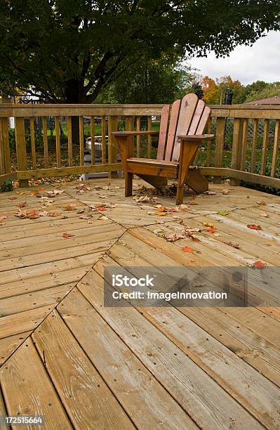 Adirondack Chair On Backyard Deck 3 Stock Photo - Download Image Now - Adirondack Chair, Autumn, Chair