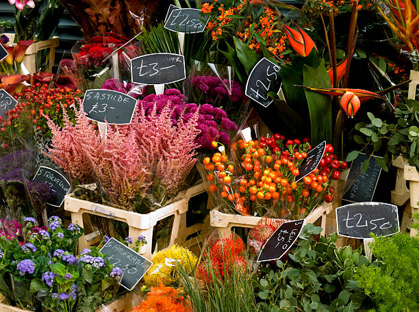 Flower stall A colourful market flower stall in London. borough market stock pictures, royalty-free photos & images