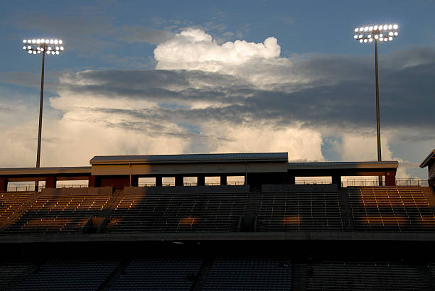 istock Night Approaching In Football Stadium With Array Of Lights 172516124