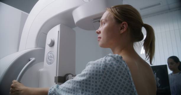 istock Female patient undergoing mammography screening procedure 1725163867