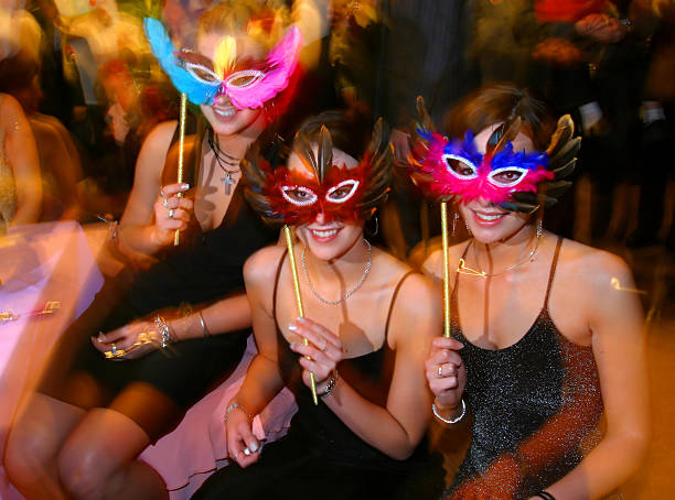 masked ball three beauties in masked ballThe two girls on the right are twins! carnival mask women party stock pictures, royalty-free photos & images