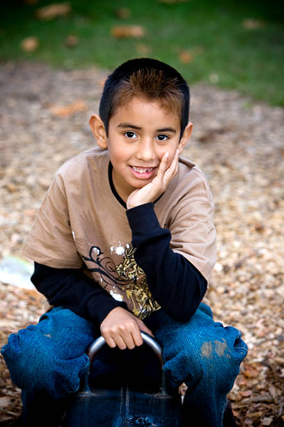 istock Adorable Hispanic Boy Portrait at Playground on Fall Day 172516529