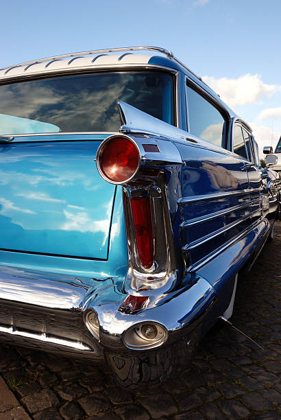 beautiful american station wagon with a mirroring sky.