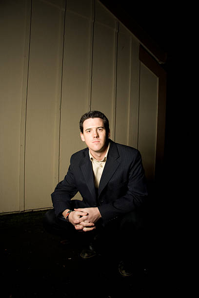 istock young professional man in the shadows 172516793