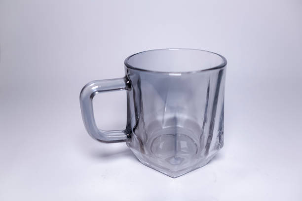 istock Close up of clear glass cup on white background. 1725213731