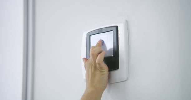 istock Nurse uses sensor thermostat or pressure controller in hospital room 1725227478