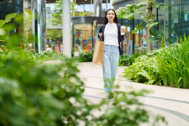 istock Woman walking in shopping mall. 1725298822