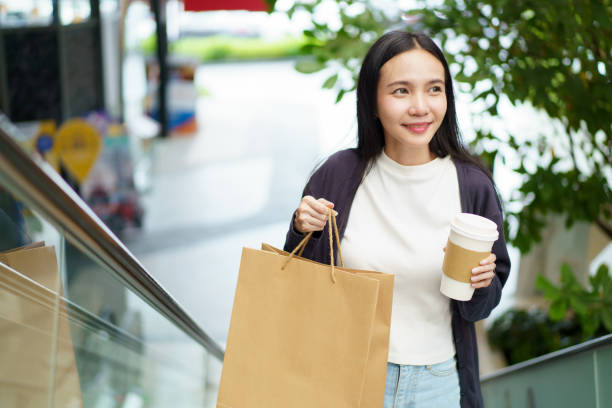 istock Woman walking in shopping mall. 1725298837