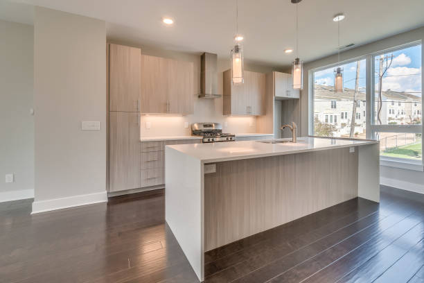 istock Three pendant lights above kitchen island in a modern kitchen 1725317318