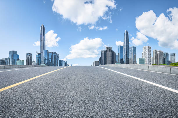 istock Shenzhen city skyline and asphalt road background 1725387330