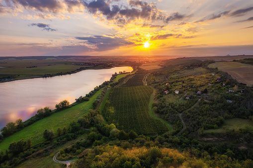 Drone shot: the sweet lake in the Mansfelder Land lake area at sunset