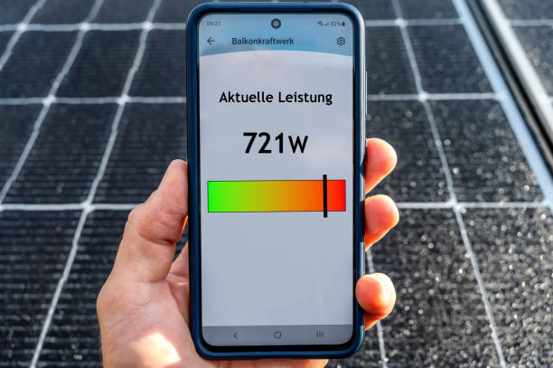 istock Self-designed app interface on a smartphone in front of a solar cell on the topic of renewable energy and smart home 1725421879