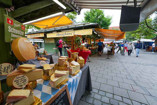 Munich, Germany, Europe - September 13, 2023. Bavarian cheese at the Viktualienmarkt, a popular and famous market in Munich, located in the heart of the city a few steps from Marienplatz and St. Peter's Church in Old Town.